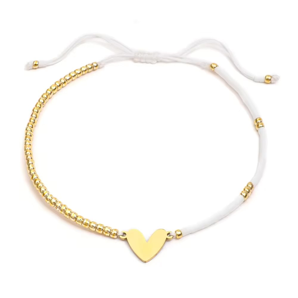 Pulsera Corazon de Hilo dorada