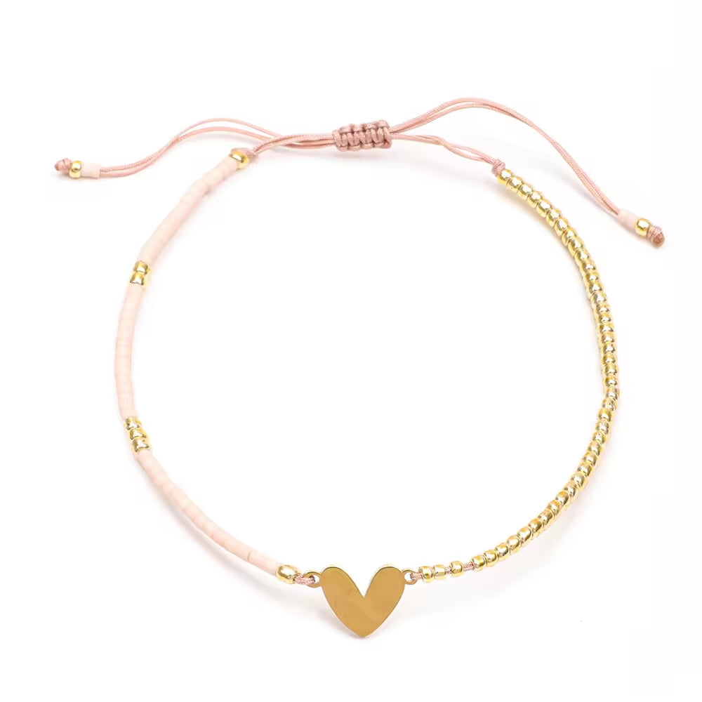 Pulsera Corazon de Hilo dorada